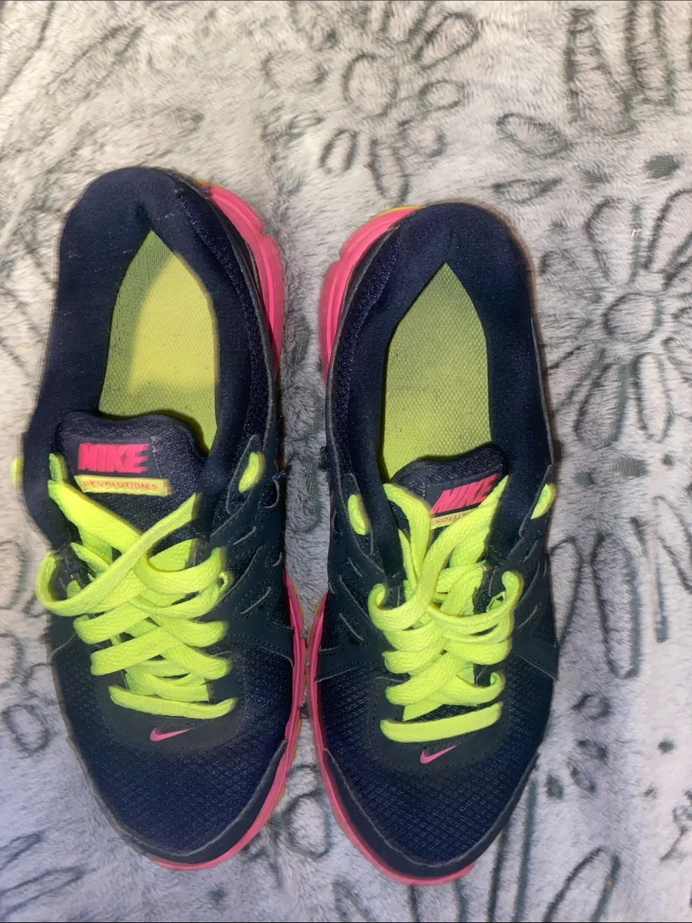Nike women’s Navy Sneakers with Neon Green Laces and Pink Accents